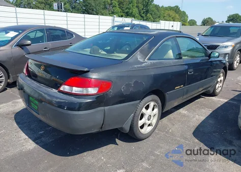 1999 Toyota Camry Solara Sle z USA, uszkodzony, nr VIN 2T1CF22PXXC164549
